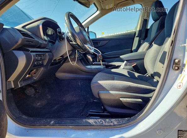 JF2GTADC9JH224484 2018 SUBARU CROSSTREK Teal Vista interior delantera