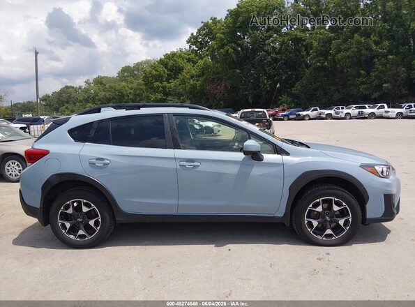 JF2GTAEC0KH393972 2019 SUBARU CROSSTREK Light Blue Rear interior view