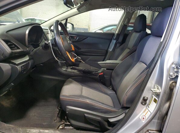 JF2GTAEC4K8232217 2019 SUBARU CROSSTREK Silver Front interior view