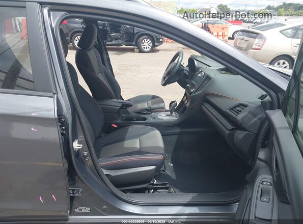 JF2GTAEC4P8225551 2023 SUBARU CROSSTREK Серый Вид салона спереди