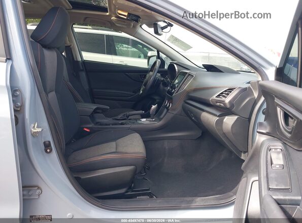 JF2GTAEC8M8298045 2021 SUBARU CROSSTREK Light Blue წინა სალონის ხედი