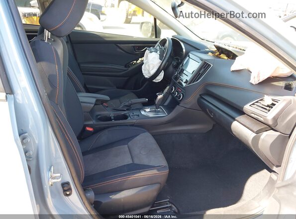 JF2GTAEC9PH243026 2023 SUBARU CROSSTREK Light Blue Vista interior delantera