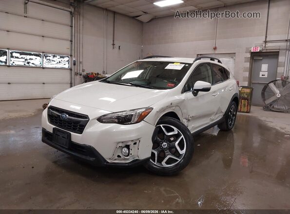 JF2GTAJC1JH238643 2018 SUBARU CROSSTREK White Vista tres cuartos delantera izquierda