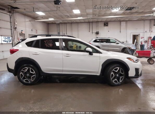 JF2GTAJC1JH238643 2018 SUBARU CROSSTREK White Vista interior trasera