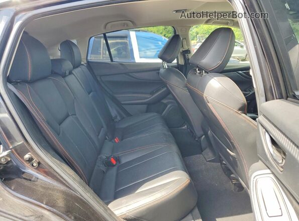 JF2GTAMC6K8200869 2019 SUBARU CROSSTREK Charcoal Vista interior trasera