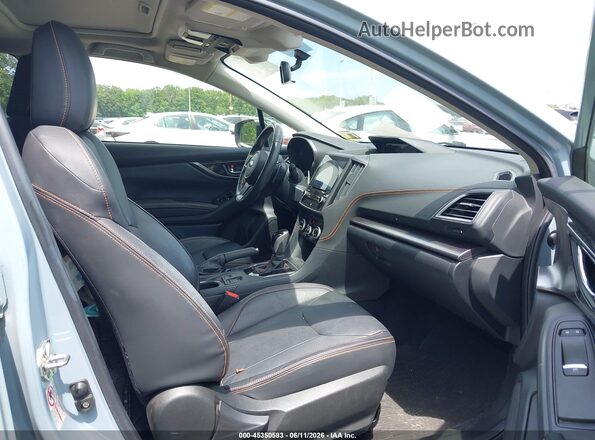 JF2GTAMC7K8222038 2019 SUBARU CROSSTREK Light Blue Вид салона спереди