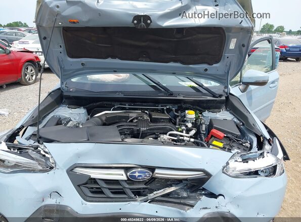 JF2GTHMC1M8678659 2021 SUBARU CROSSTREK Light Blue Вид сзади
