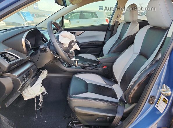 JF2GTHMC7MH347584 2021 SUBARU CROSSTREK Blue Front interior view