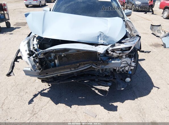 JF2GTHNC8NH221850 2022 SUBARU CROSSTREK Light Blue Front view