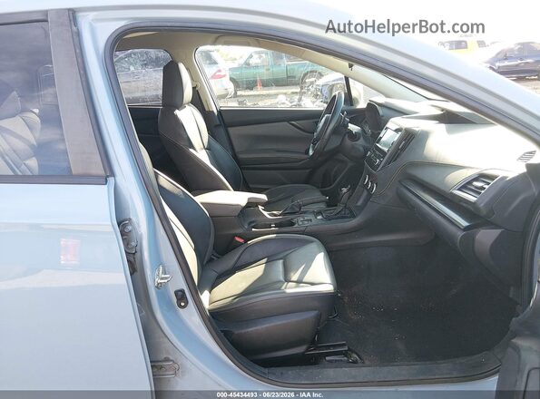 JF2GTHRCXMH253014 2021 SUBARU CROSSTREK Light Blue Вид салона спереди