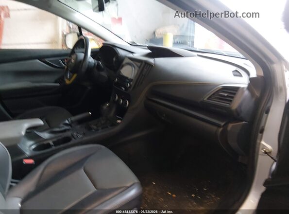 JF2GTHSC5MH208864 2021 SUBARU CROSSTREK Silver Front interior view