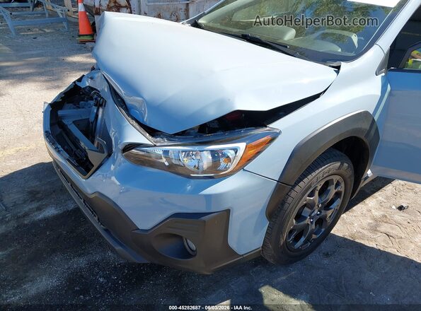 JF2GTHSC5PH231484 2023 SUBARU CROSSTREK Light Blue Front view