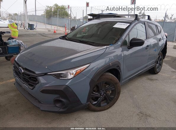 JF2GUABC1R8230601 2024 SUBARU CROSSTREK Light Blue Vista tres cuartos delantera izquierda