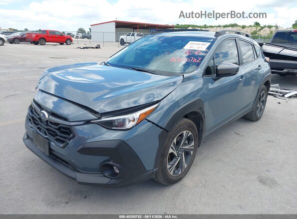 JF2GUADC4RH326591 2024 SUBARU CROSSTREK Dark Blue Vista tres cuartos delantera izquierda