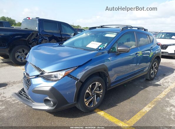 JF2GUADC9RH885876 2024 SUBARU CROSSTREK Light Blue Vista tres cuartos delantera izquierda