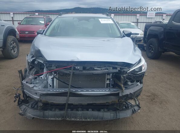 JF2GUHDC4S8222648 2025 SUBARU CROSSTREK Silver Սալոնի հետևի տեսք