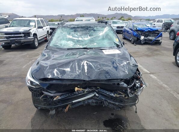 JF2GUHDC4S8274622 2025 SUBARU CROSSTREK Black Rear interior view