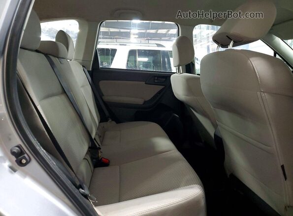 JF2SJAAC4GG452623 2016 SUBARU FORESTER Silver Rear interior view