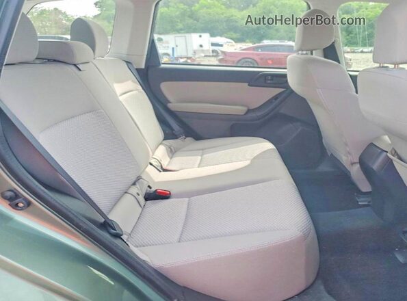 JF2SJAAC7GH483309 2016 SUBARU FORESTER Green Rear interior view