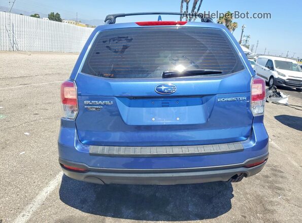 JF2SJABC2JH463703 2018 SUBARU FORESTER Blue Вид ззаду