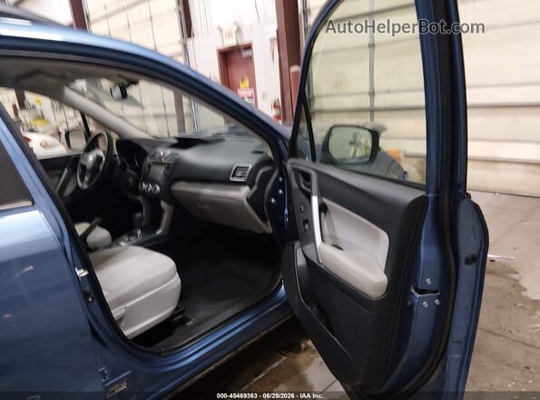 JF2SJABC6GH423844 2016 SUBARU FORESTER Blue Vista interior delantera