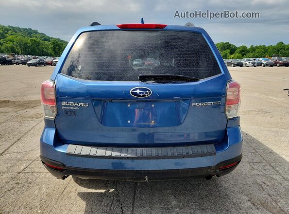JF2SJABC6JH479001 2018 SUBARU FORESTER Blue Widok z tyłu