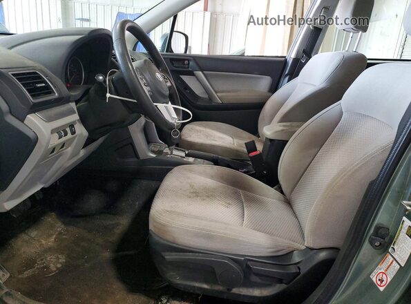 JF2SJABC7JH598000 2018 SUBARU FORESTER Зеленый Вид салона спереди