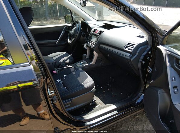JF2SJABCXGH476689 2016 SUBARU FORESTER Black Front interior view