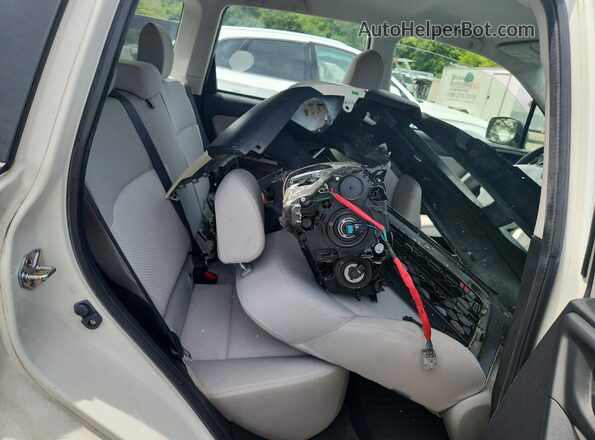 JF2SJABCXGH557076 2016 SUBARU FORESTER White Rear interior view