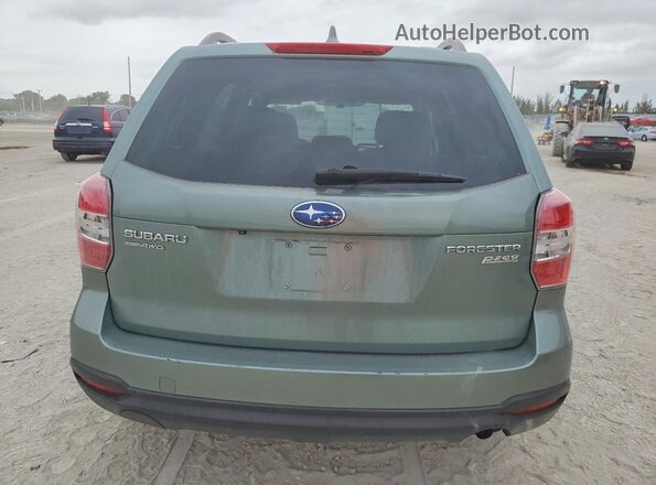 JF2SJADC0GH527680 2016 SUBARU FORESTER Teal Вид ззаду