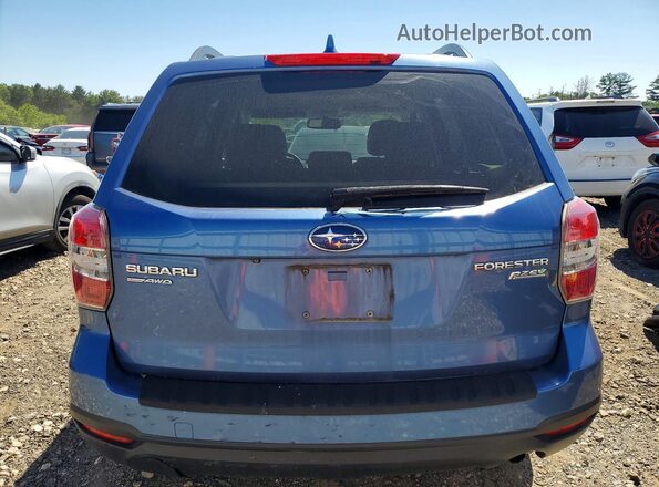 JF2SJADC1GH400906 2016 SUBARU FORESTER Blue Vista trasera