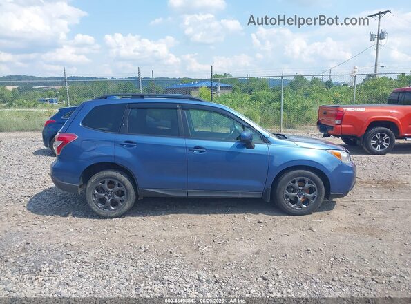 JF2SJADC1GH465304 2016 SUBARU FORESTER Blue Widok wnętrza z tyłu