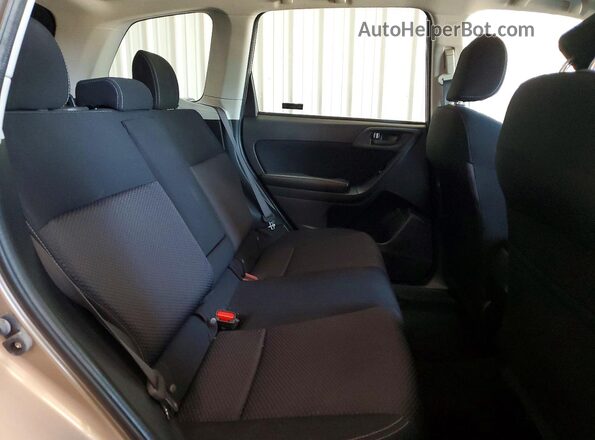 JF2SJADC2GH450973 2016 SUBARU FORESTER Silver Rear interior view
