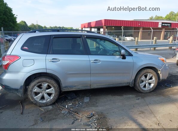 JF2SJADC5GH524662 2016 SUBARU FORESTER Silver Vista interior trasera