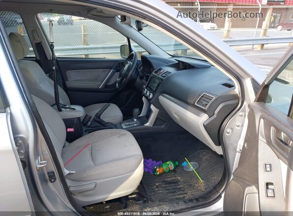 JF2SJADC5GH524662 2016 SUBARU FORESTER Silver Vista interior delantera