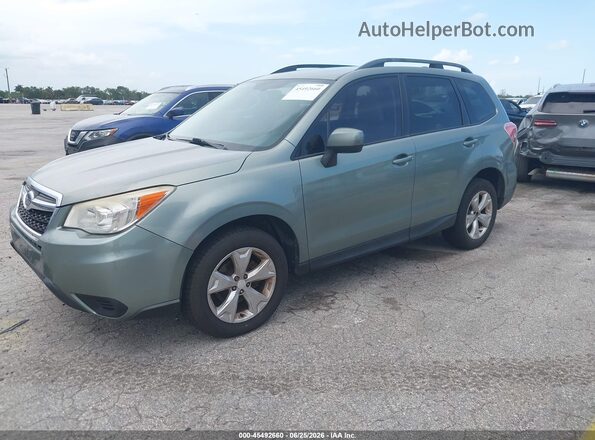 JF2SJADC6GH408192 2016 SUBARU FORESTER Green Vista tres cuartos delantera izquierda