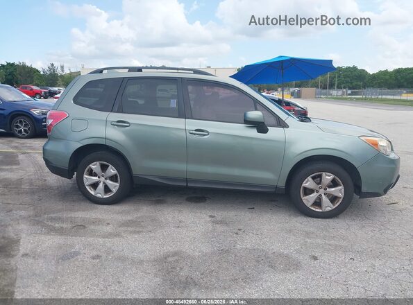 JF2SJADC6GH408192 2016 SUBARU FORESTER Green Vista interior trasera