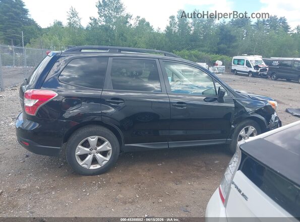 JF2SJADC6GH485807 2016 SUBARU FORESTER Black Rear interior view
