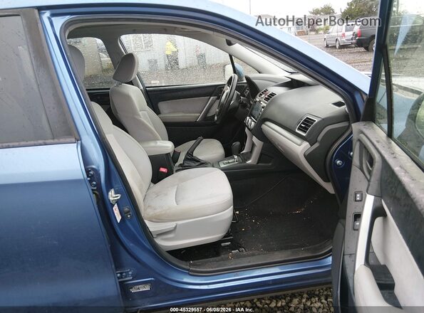 JF2SJADC6GH559047 2016 SUBARU FORESTER Light Blue წინა სალონის ხედი