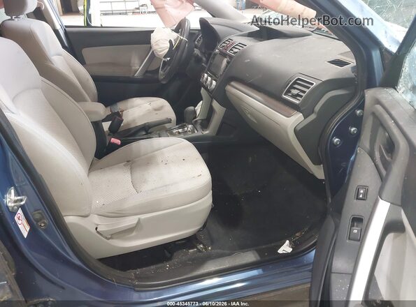 JF2SJADC7GH416060 2016 SUBARU FORESTER Blue Front interior view