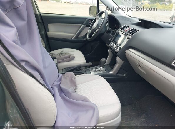 JF2SJADC7GH561812 2016 SUBARU FORESTER Light Blue Widok wnętrza z przodu