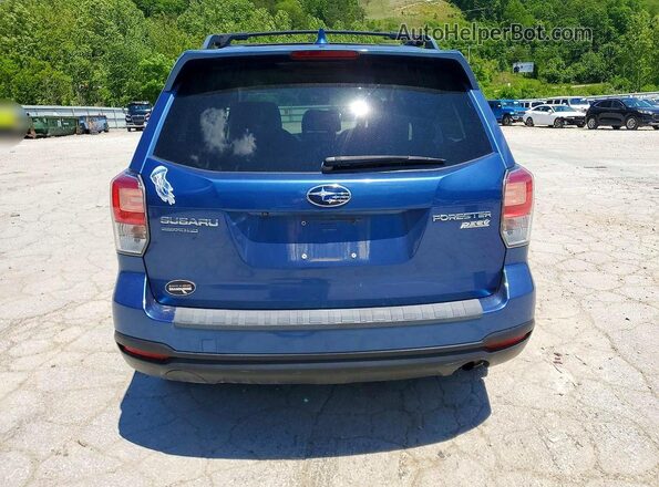 JF2SJAEC2HH534629 2017 SUBARU FORESTER Blue Rear view