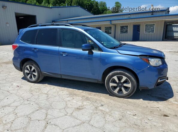 JF2SJAEC2HH534629 2017 SUBARU FORESTER Blue Front right