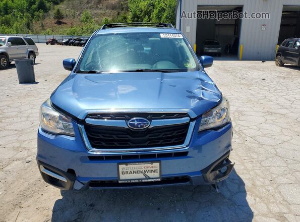 JF2SJAEC2HH534629 2017 SUBARU FORESTER Blue Front view