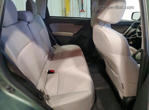 JF2SJAEC2HH579943 2017 SUBARU FORESTER Green Widok wnętrza z tyłu