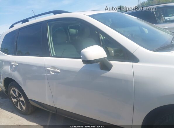JF2SJAEC3JH534693 2018 SUBARU FORESTER White Սալոնի հետևի տեսք