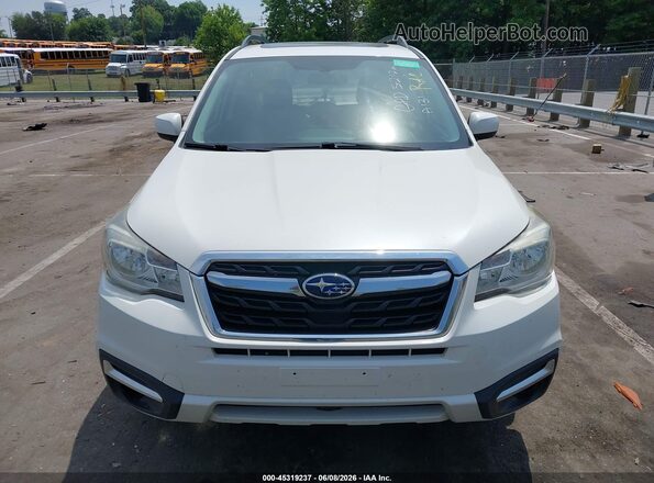 JF2SJAEC5HH441085 2017 SUBARU FORESTER White Rear interior view