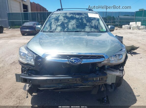 JF2SJAEC7HH442755 2017 SUBARU FORESTER Green Սալոնի հետևի տեսք