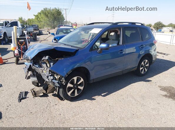 JF2SJAEC8HH511839 2017 SUBARU FORESTER Light Blue Vista tres cuartos delantera izquierda