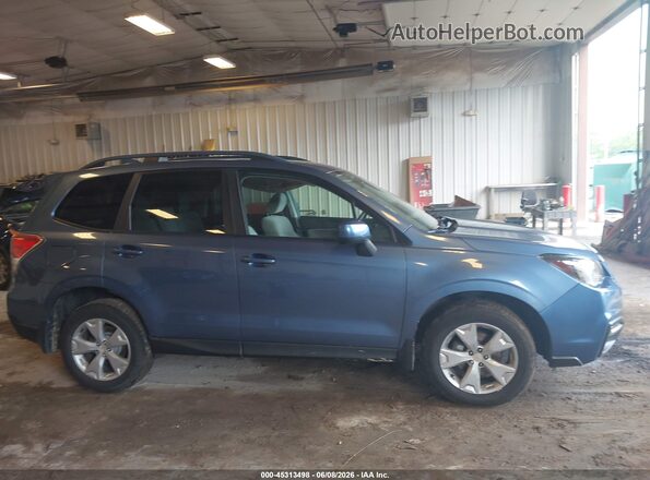 JF2SJAEC8JH474555 2018 SUBARU FORESTER Синий Вид задней части салона